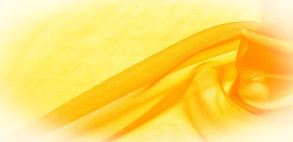 Texture of yellow silk fabric. It is also perfect for your desig