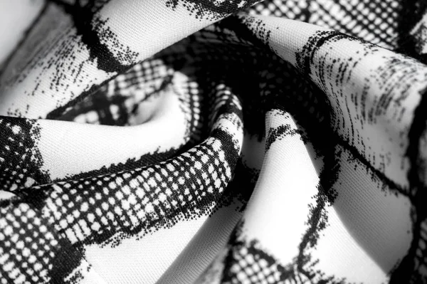 Texturu, pozadí, vzorek. bílá tkanina s černým abstraktním f — Stock fotografie