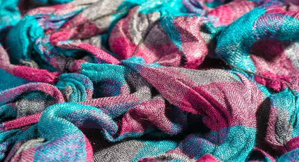 Textur bakgrund, kvinnlig halsduk texturerat krispigt tyg. En halsduk — Stockfoto