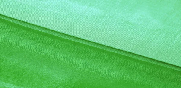 Tekstur kain sutra hijau. Hal ini juga sempurna untuk desain Anda — Stok Foto