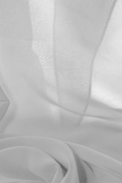Текстура фонового візерунка. Біла шовкова тканина з тонким матовим — стокове фото