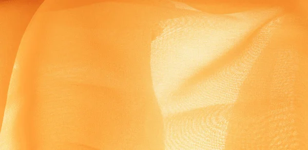 テクスチャの背景パターン。微妙なマットの黄色いシルク生地 — ストック写真
