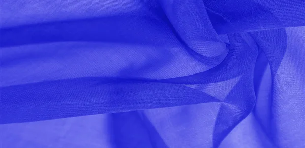 Texture of blue silk fabric. It is also perfect for your design,