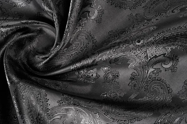 Texture, background, black steel gray fabric with a paisley patt — Stock Photo, Image