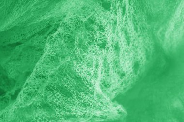 Örgü yeşilli kumaş. Sizin için ruhani parlaklık bir çizgi ekleyin