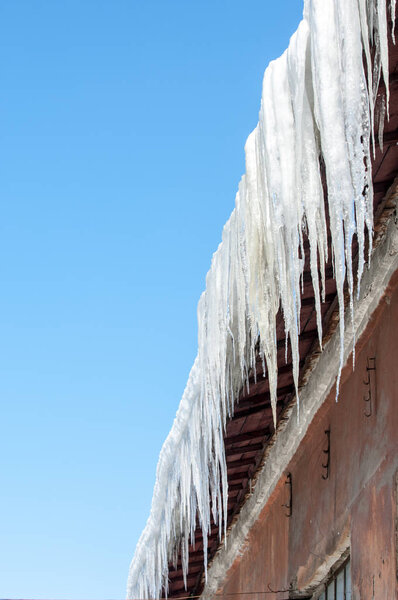 icicles on old building