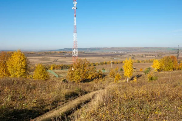 Autumn Landscape, Telephone Relay Tower. engaged in a task or ac