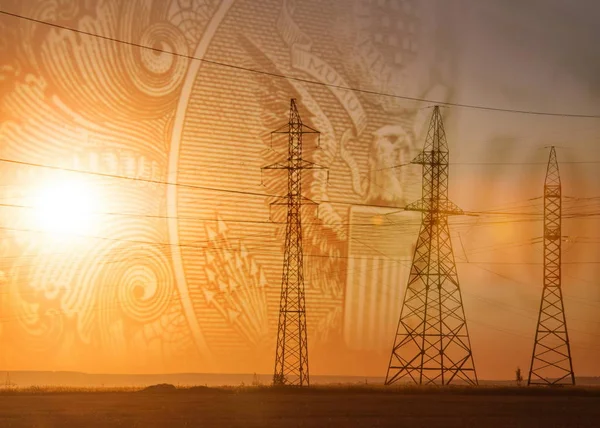 High-voltage power transmission line. Energy pillars. At sunset, — Stock Photo, Image