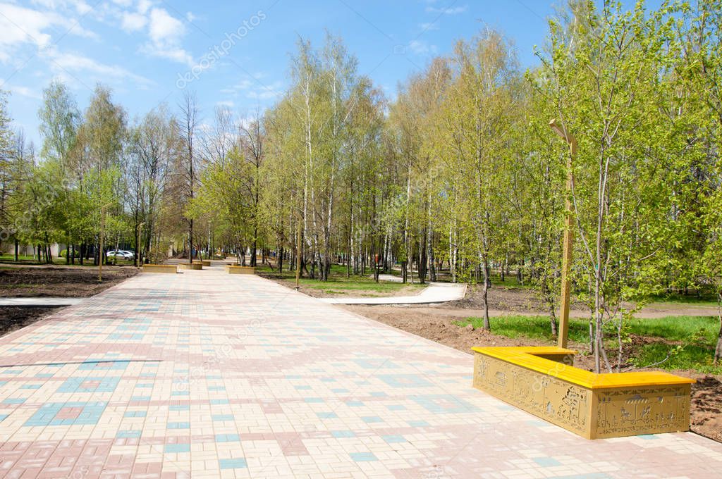 Photo of the spring mall. Early morning wide-angle photo of a pr