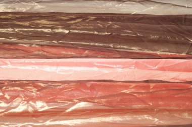 Pembe kahverengi şeffaf kumaş. doku. bornoz.