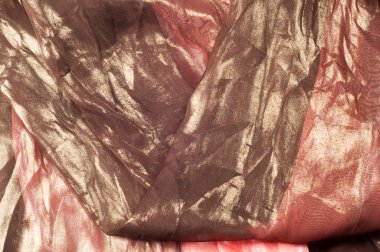 Pembe kahverengi şeffaf kumaş. doku. bornoz.