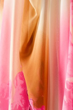 Pembe kumaş çiçek işlemeli. doku