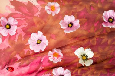 Pembe kumaş çiçek işlemeli. doku