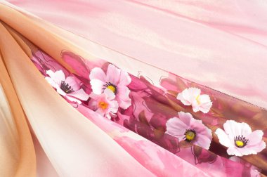 Pembe kumaş çiçek işlemeli. doku