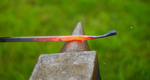 Flea market, folk crafts. Blacksmith for work, The tool forged. smith, farrier, forger, smithy, hammersmith