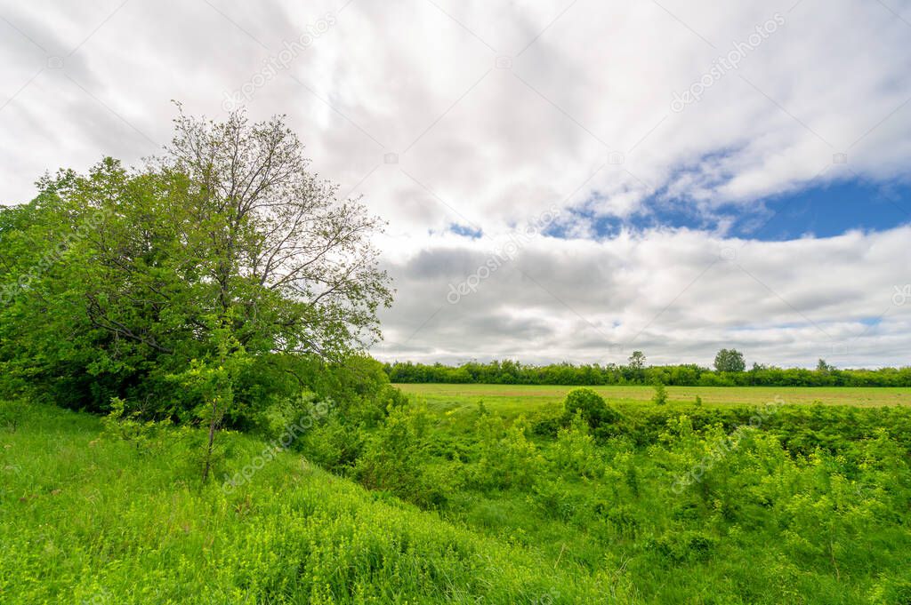 Spring photography, meadows, fields, ravines, hills, rural landscape.