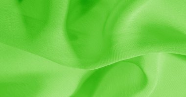 Arka plan, desen, doku, duvar kağıdı, yeşil soluk ipek kumaş parlak bir ışıltıya sahip. Bu çok yönlü bir kumaş. Tasarımının güzel aksanlarıyla yaratıcı ol..