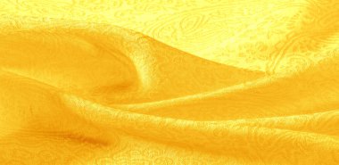 Arkaplan desenli kumaş çiçek süsü sarısı. Bu pamuk baskısı koleksiyonu parlak renkler ve şirin temalarla ayırt edilir. Herhangi bir proje, tasarım ve çevrimiçi dekor ögeleri için ideal.