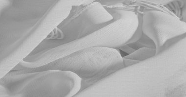 Arka plan, desen, doku, duvar kağıdı, beyaz ipek kumaş parlak bir parlaklık vardır. Bu en çok yönlü kumaştır. Tasarımınızın güzel vurgularıyla yaratıcı olun.