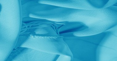 Arka plan, desen, doku, duvar kağıdı, mavi ipek kumaşın parlak bir parıltısı var. Bu çok yönlü bir kumaş. Tasarımının güzel aksanlarıyla yaratıcı ol..