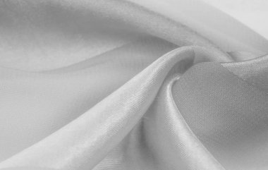 Doku, arkaplan, metalik parıltılı beyaz ipek çizgili kumaş. Eğer kötü bir ruh halin varsa, bu kumaş onu eşi görülmemiş yüksekliklere taşıyacaktır. Projeniz başarılı olacak..