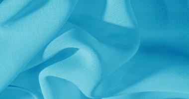 Arka plan, desen, doku, duvar kağıdı, mavi ipek kumaşın parlak bir parıltısı var. Bu çok yönlü bir kumaş. Tasarımının güzel aksanlarıyla yaratıcı ol..
