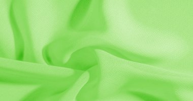 Arka plan, desen, doku, duvar kağıdı, yeşil soluk ipek kumaş parlak bir ışıltıya sahip. Bu çok yönlü bir kumaş. Tasarımının güzel aksanlarıyla yaratıcı ol..