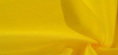 Doku arka plan deseni, sarı kumaş ipek. Krep saten arka tasarım için mükemmel bir kumaş, bir yandan bir saten bitirmek ve diğer - krep, hangi geri dönüşümlü hale getirir