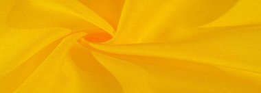 Doku arka plan deseni, sarı kumaş ipek. Krep saten arka tasarım için mükemmel bir kumaş, bir yandan bir saten bitirmek ve diğer - krep, hangi geri dönüşümlü hale getirir