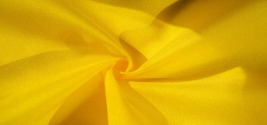 Doku arka plan deseni, sarı kumaş ipek. Krep saten arka tasarım için mükemmel bir kumaş, bir yandan bir saten bitirmek ve diğer - krep, hangi geri dönüşümlü hale getirir