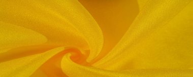 Doku arka plan deseni, sarı kumaş ipek. Krep saten arka tasarım için mükemmel bir kumaş, bir yandan bir saten bitirmek ve diğer - krep, hangi geri dönüşümlü hale getirir
