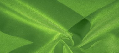 Doku, arka plan, desen, ipek yeşil kumaş. Krep saten arka tasarım için mükemmel bir kumaş, bir yandan bir saten bitirmek vardır, ve diğer - krep, hangi geri dönüşümlü hale getirir,