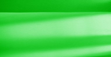 Resim. Doku, arka plan. yeşil zümrüt ipek kumaş. Bu orta / ipeksi ipek kumaş kumaş bir şerit bakmak vermek için hafif renk varyasyonları ile harika bir parlaklık vardır.