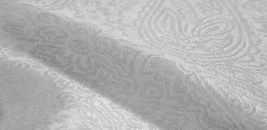 Arkaplan desenli kumaş çiçekli süs beyazı. Bu pamuk baskısı koleksiyonu parlak renkler ve şirin temalarla ayırt edilir. Herhangi bir proje, tasarım ve çevrimiçi dekor ögeleri için ideal.