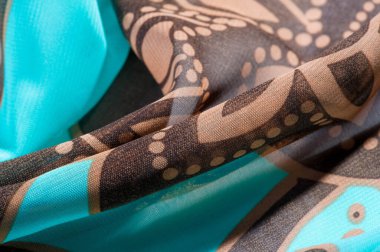 doku, arka plan, desen, duvar kağıdı. kahverengi ipek kumaş deseni. Bu orta ağırlık rayon kumaş hafif renk varyasyonları ile güzel bir parlaklık vardır. Tasarımlarınıza şıklık katıyor.