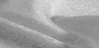 Arkaplan desenli kumaş çiçekli süs beyazı. Bu pamuk baskısı koleksiyonu parlak renkler ve şirin temalarla ayırt edilir. Herhangi bir proje, tasarım ve çevrimiçi dekor ögeleri için ideal.