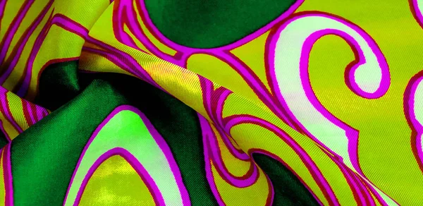 silk abstract fabric This luxurious silk chiffon fabric is a show-stopper. It is transparent has a liquid drape and is very soft. Perfect for your projects. Colors include green yellow white and pink