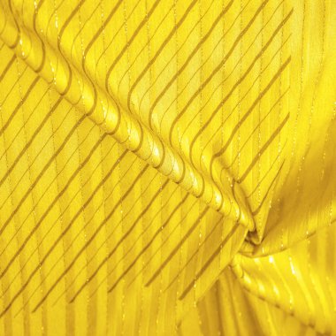 Tasarım arka plan dokusu, sarı kehribar rengi kumaş. Taze ve rahat bir stil için mükemmel..