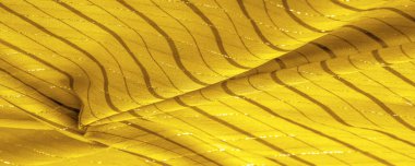 Tasarım arka plan dokusu, sarı kehribar rengi kumaş. Taze ve rahat bir stil için mükemmel..