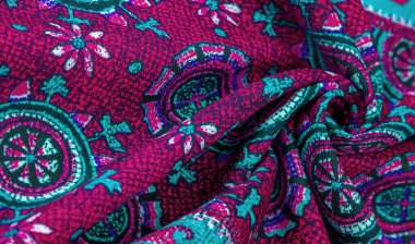 Arka plan tasarım dokusu, kırmızı ipek kumaş ve mavi çiçek desenli daireler. Charmeus 'un çok güzel bir kumaşı var. Yumuşak bir doluluk içinde birleştirilebilir..