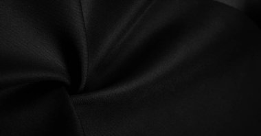 Doku, arkaplan, desen, siyah ipek kumaş, bu ipek saten dokuma. Yoğunluğu, pürüzsüzlüğü ve parlaklığı farklı, yumuşaklığı iyi örtülmüş. Tasarım kullan, projeler