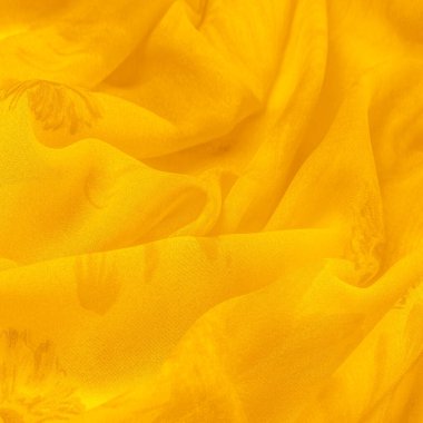 Arkaplan dokusu, sarı ipek kumaş boyalı çayır çiçekleri, spektrumda yeşil ve turuncu arasında renkler, ana çıkarıcı renk, olgun limon ya da yumurta sarısı gibi boyanmış..