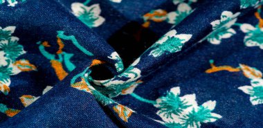 Doku, arka plan, desen, çiçek yeşil renkleri ile kumaş mavi. Olasılıklarınız sonsuzdur! Cesaret ve başarı senin olacak.!