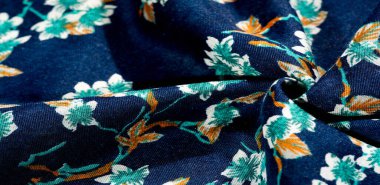 Doku, arka plan, desen, çiçek yeşil renkleri ile kumaş mavi. Olasılıklarınız sonsuzdur! Cesaret ve başarı senin olacak.!