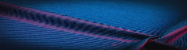 采购产品纹理 巧克力 丝绸面料 紧密编织 摄影工作室 午夜蓝色 斜纹棉织物色 光影的作用使这张照片独一无二 — 图库照片