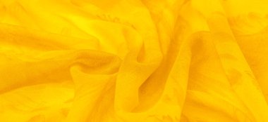 Arkaplan dokusu, sarı ipek kumaş boyalı çayır çiçekleri, spektrumda yeşil ve turuncu arasında renkler, ana çıkarıcı renk, olgun limon ya da yumurta sarısı gibi boyanmış..