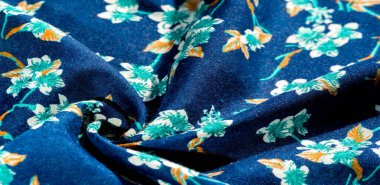 Doku, arka plan, desen, çiçek yeşil renkleri ile kumaş mavi. Olasılıklarınız sonsuzdur! Cesaret ve başarı senin olacak.!