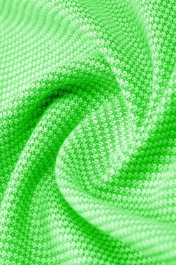 Arka plan dokusu, desenli kumaş, dikişli yeşil iplikli sıcak yün. Klasiklerden etkilenenler için zeytin, yeşil ve zümrütle harmanlanmış bu bağbozumundan esinlensinler.