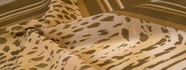 Dokusal arkaplan koleksiyonu, ipek kumaş, Afrika teması, hayvan derisi, kahverengi tonlar.