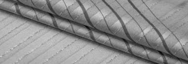 Tasarım arka plan dokusu, Lurex çizgili siyah beyaz kumaş, taze ve rahat bir stil için mükemmel..